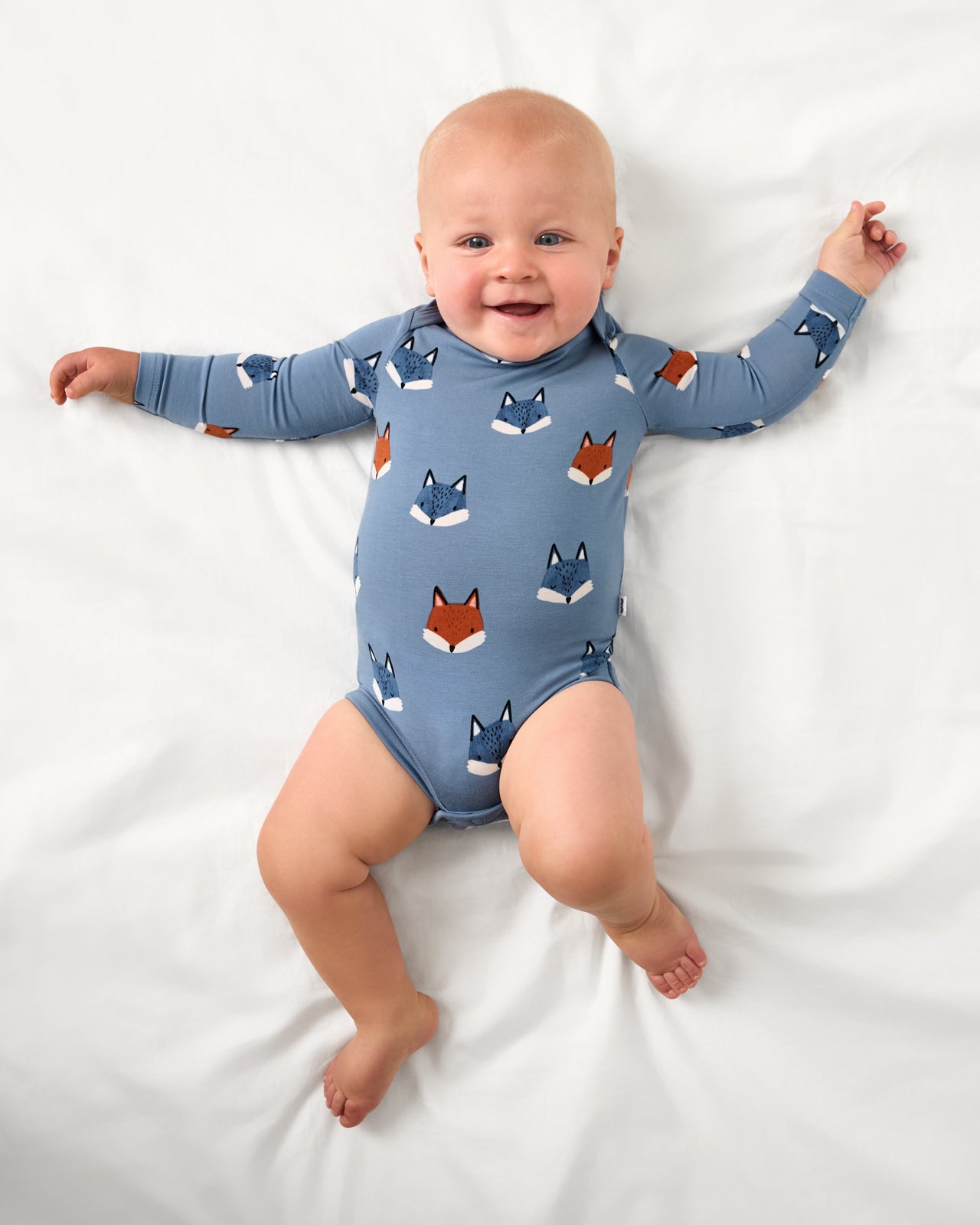 Aerial view of baby wearing the Fox Tracks Long Sleeve Bodysuit