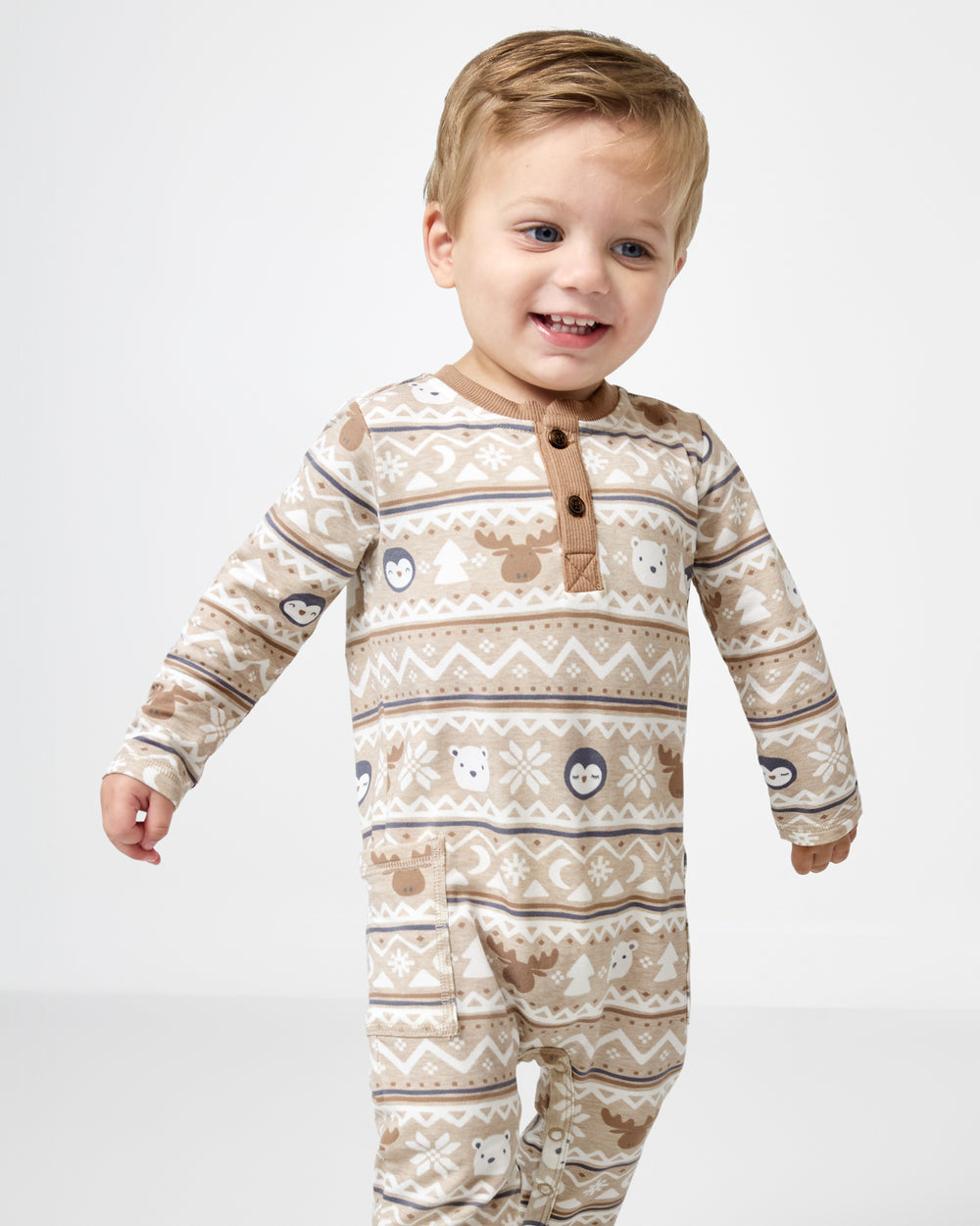 Close up of boy wearing the Frosty Fair Isle Henley Romper
