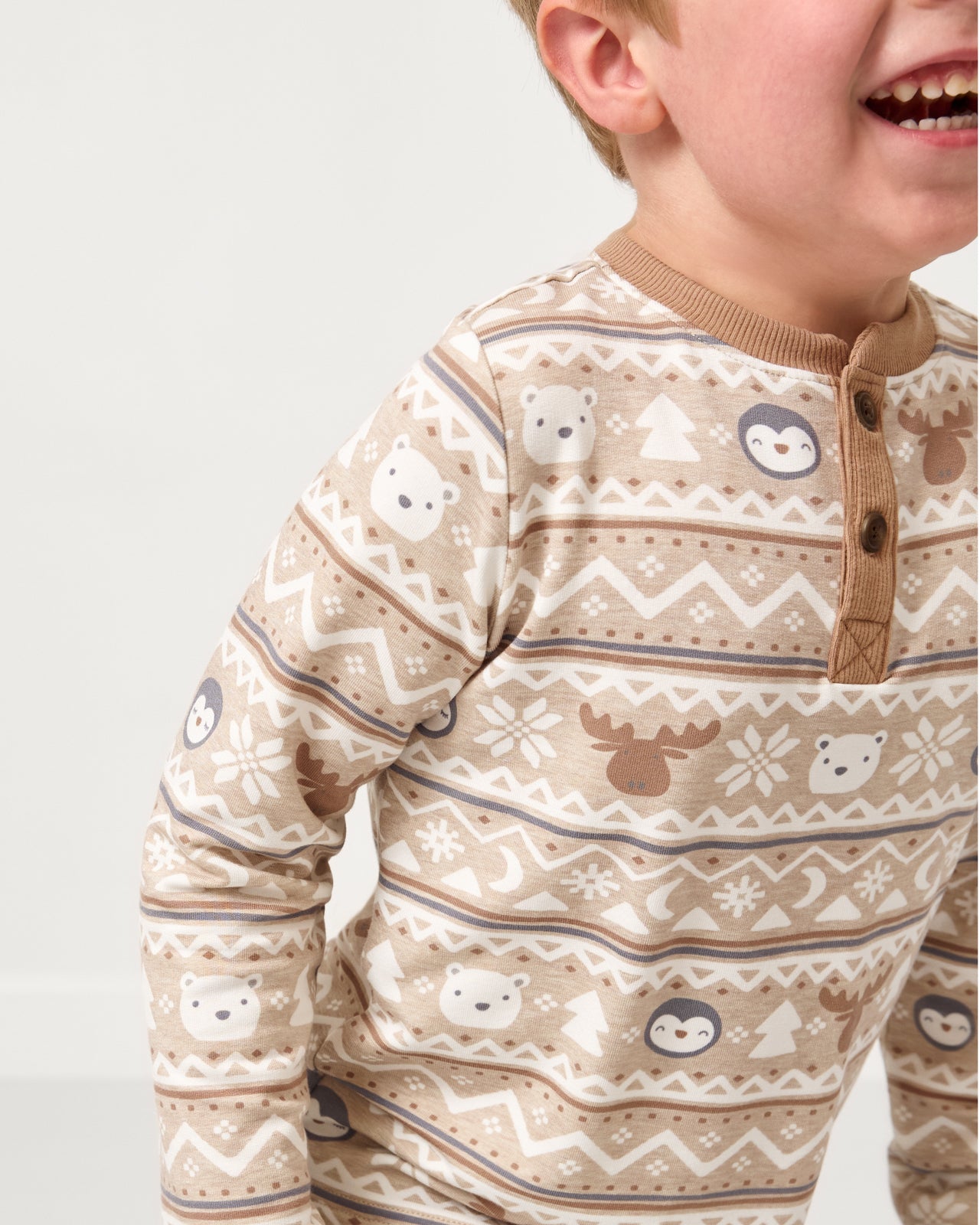 Close ip of the button detail on the Frosty Fair Isle Henley Tee