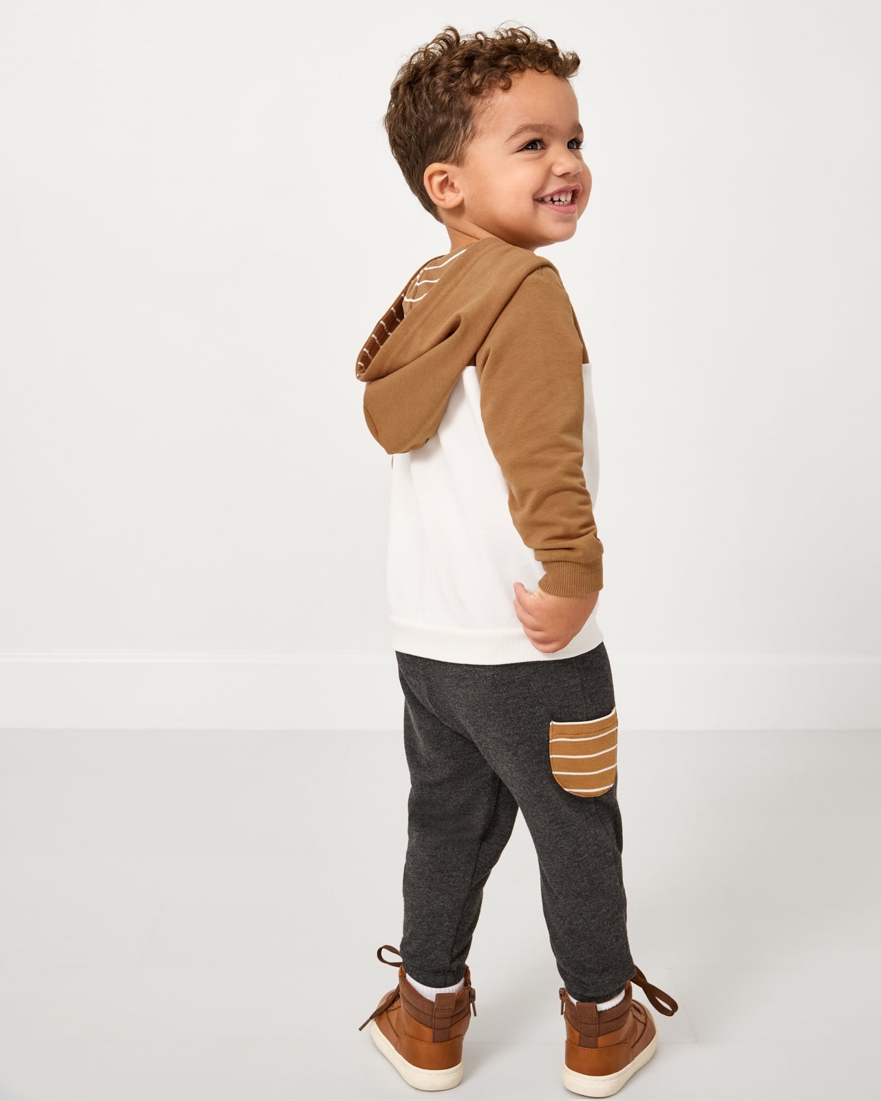 Back view of child wearing the Moose Pullover Hoodie