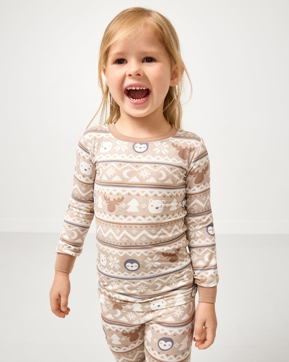 Close up of girl wearing the Frosty Fair Isle Two-Piece Pajama Set