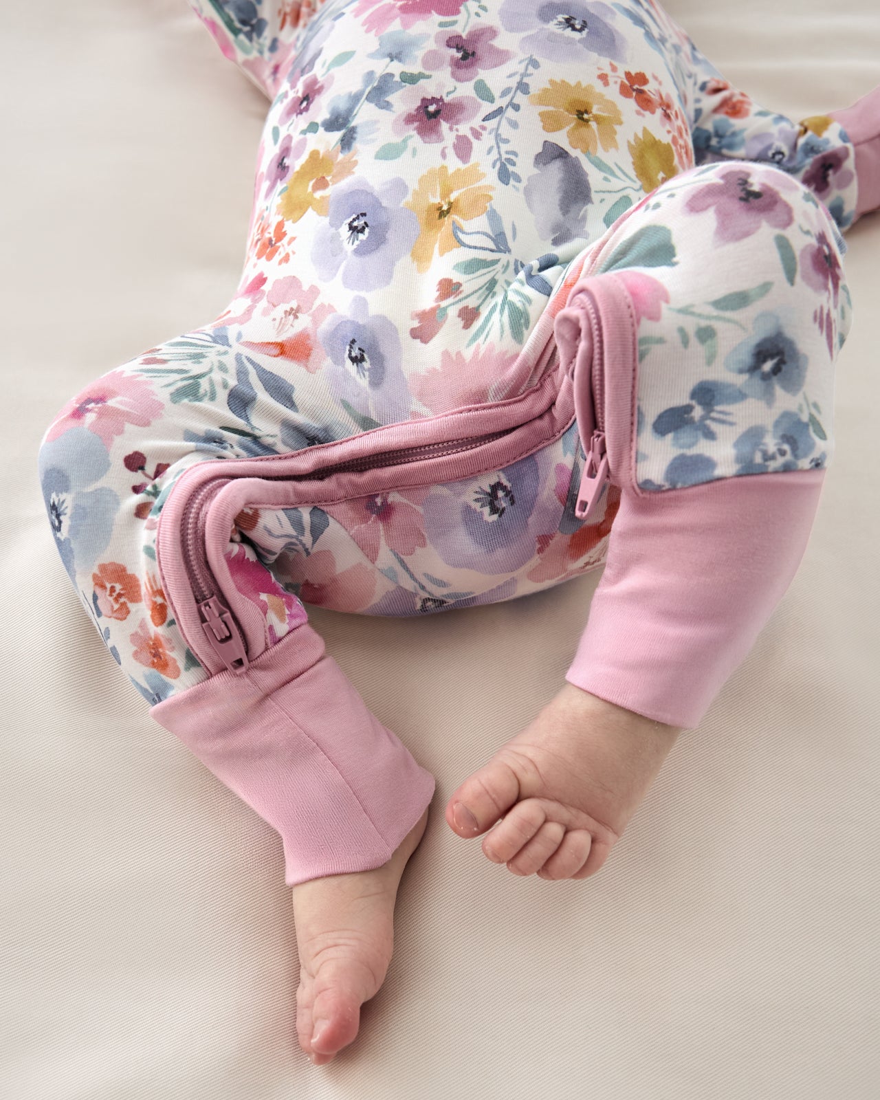 Close up of the zipper detail on the Tiny Blooms Crescent Zippy