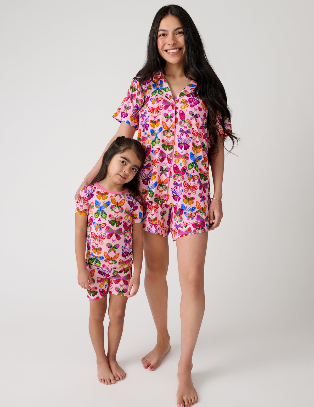 Mother and daughter wearing matching Flutter Garden Two-Piece Short Sleeve & Shorts Pajama Sets 