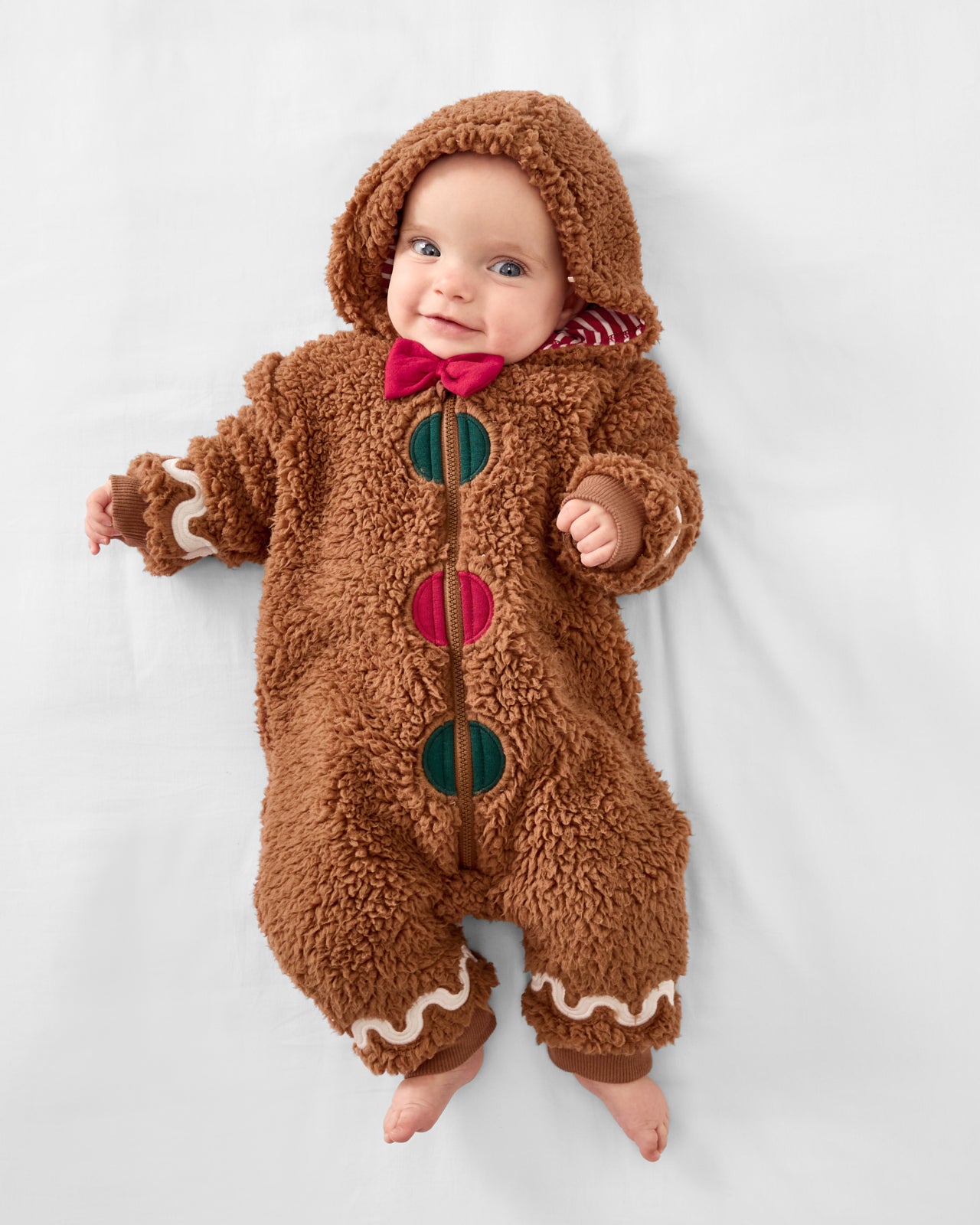 Aerial view of alternate baby wearing the Gingerbread Sherpa Romper