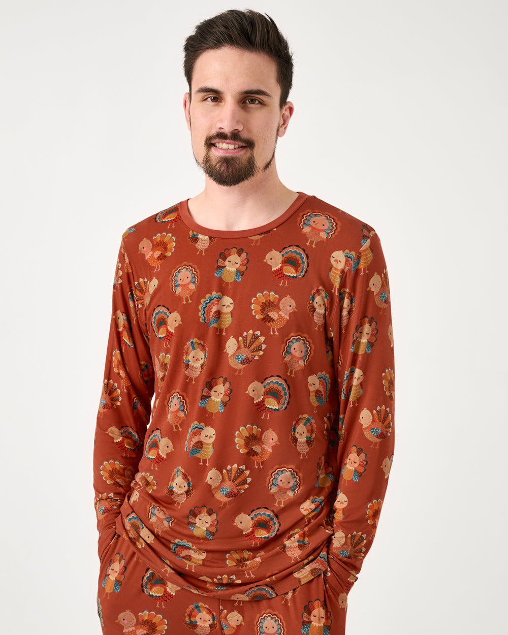 Man wearing the Grateful Gobbles Men's Long Sleeve Pajama Top