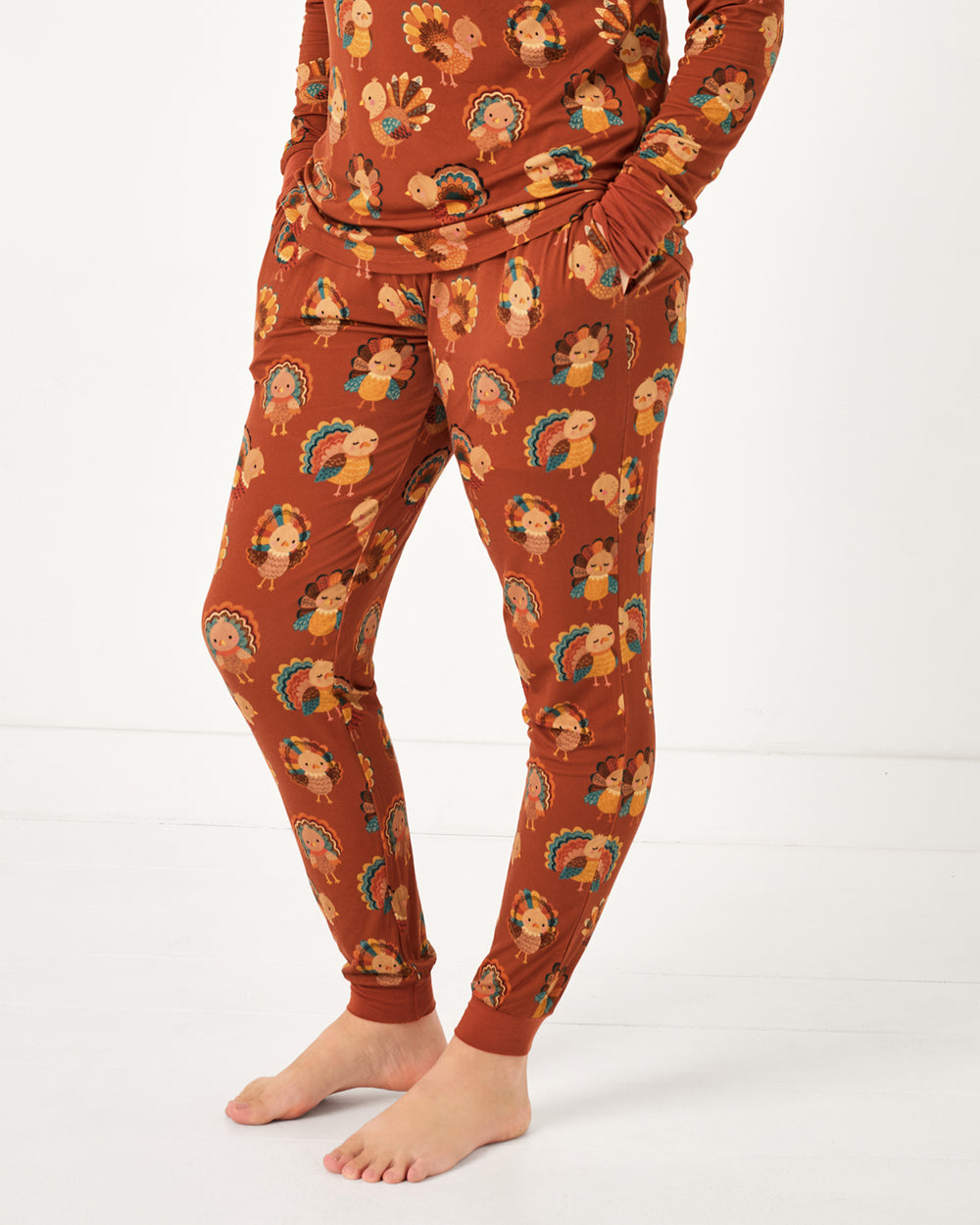 Woman wearing the Grateful Gobbles Women's Pajama Pants