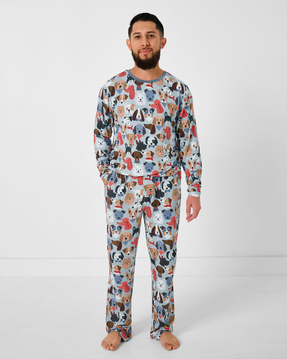 Man wearing the Gray Puppy Parade Men's Pajama Pants and Top