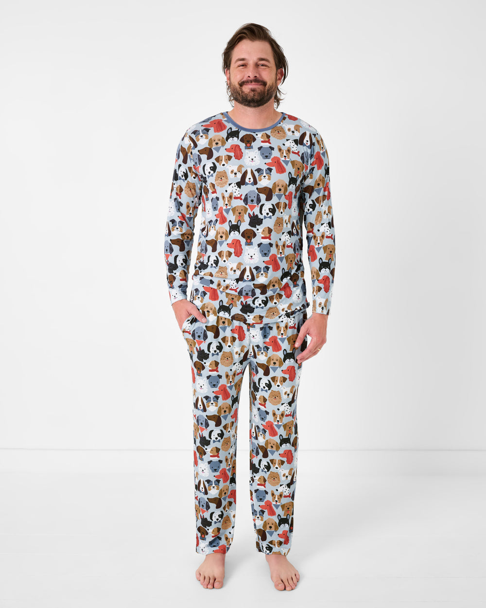 Man wearing the Gray Puppy Parade Men's Long Sleeve Pajama Top and Pants