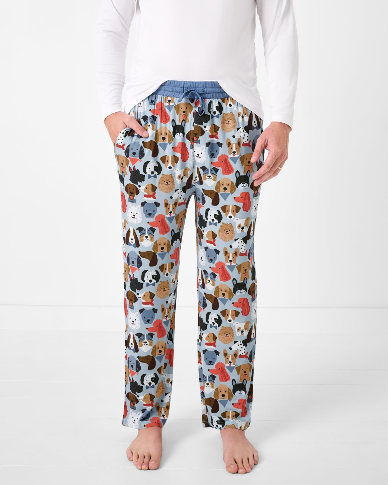 Man wearing the Gray Puppy Parade Men's Pajama Pants
