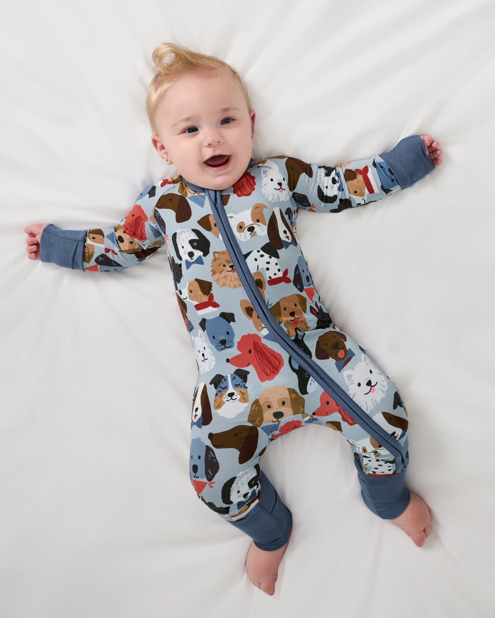 Aerial view of baby wearing the Gray Puppy Parade Zippy