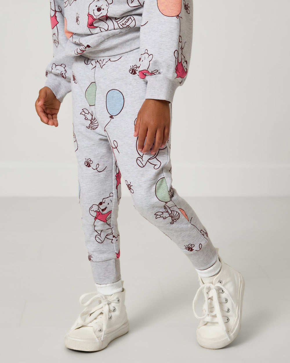 Child wearing the Disney Up, Up and Away Jogger