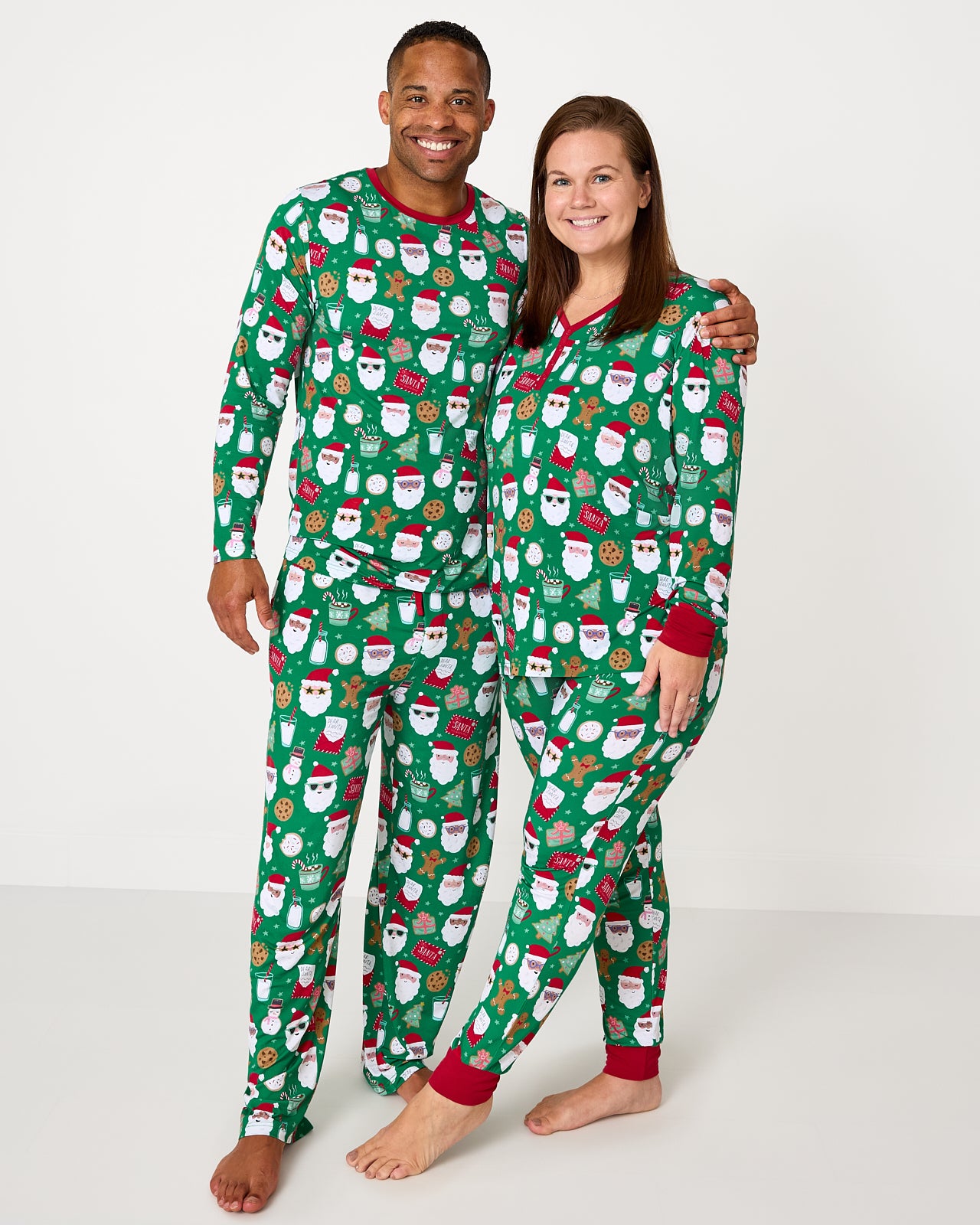 Couple wearing matching Cookies for Santa bamboo pajamas