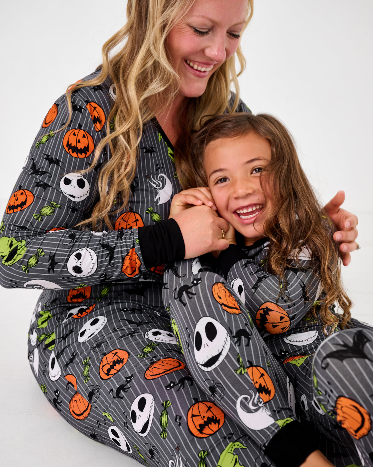 Mother and daughter wearing matching Disney The Nightmare Before Christmas Pajamas 