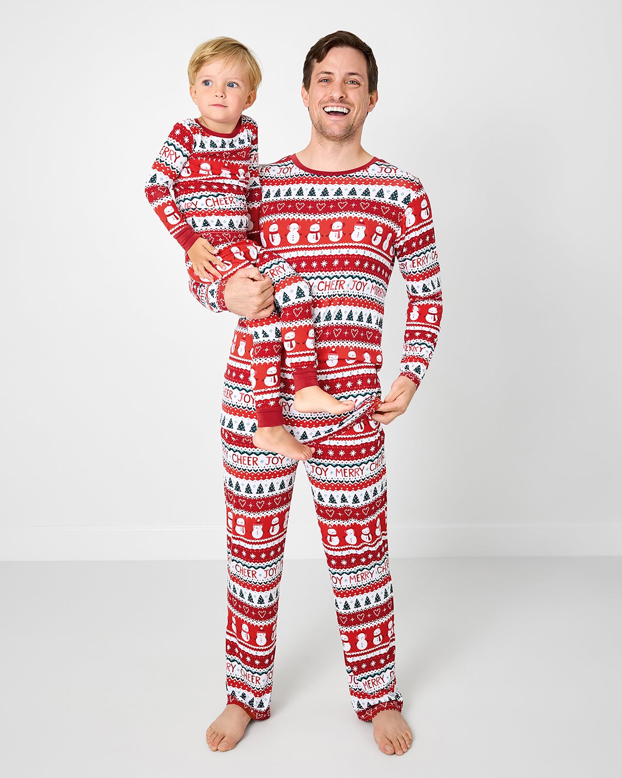 Father and son wearing matching xFestive Fair Isle bamboo pajamas