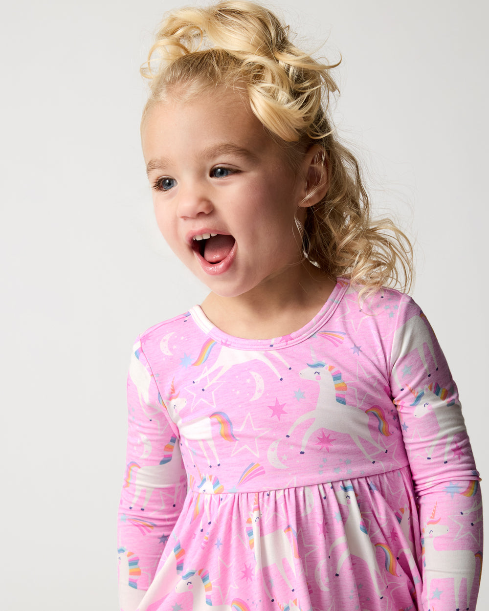 Close up of girl wearing the Unicorn Dance Twirl Dress