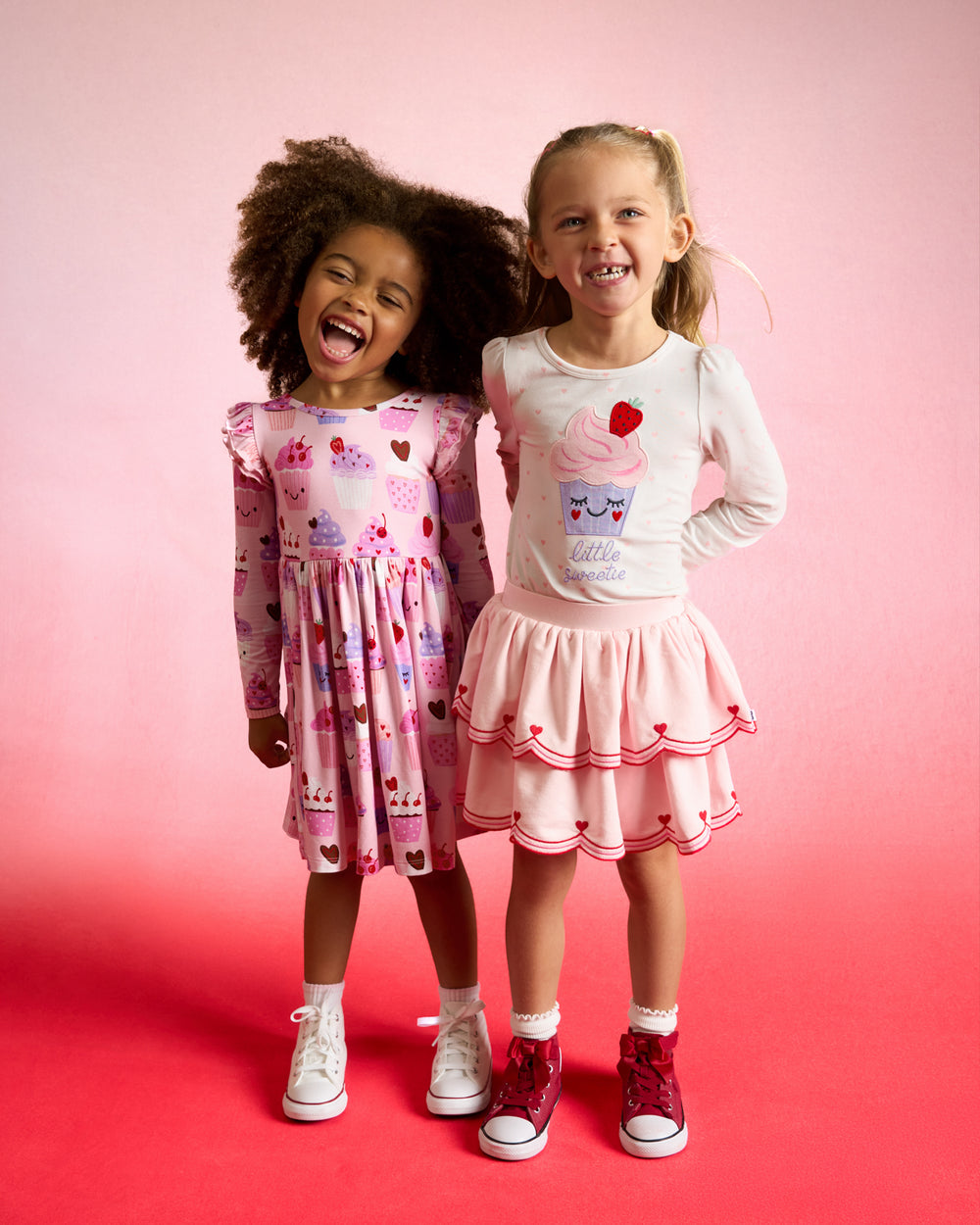 Two girls wearing styles from the Valentines Day dropped