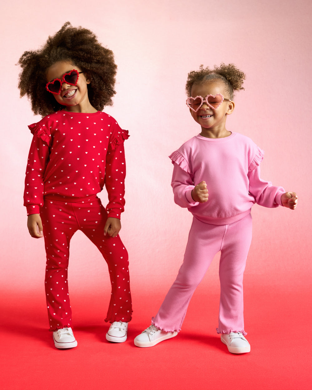 Two girls wearing outfits from the Valentines drop