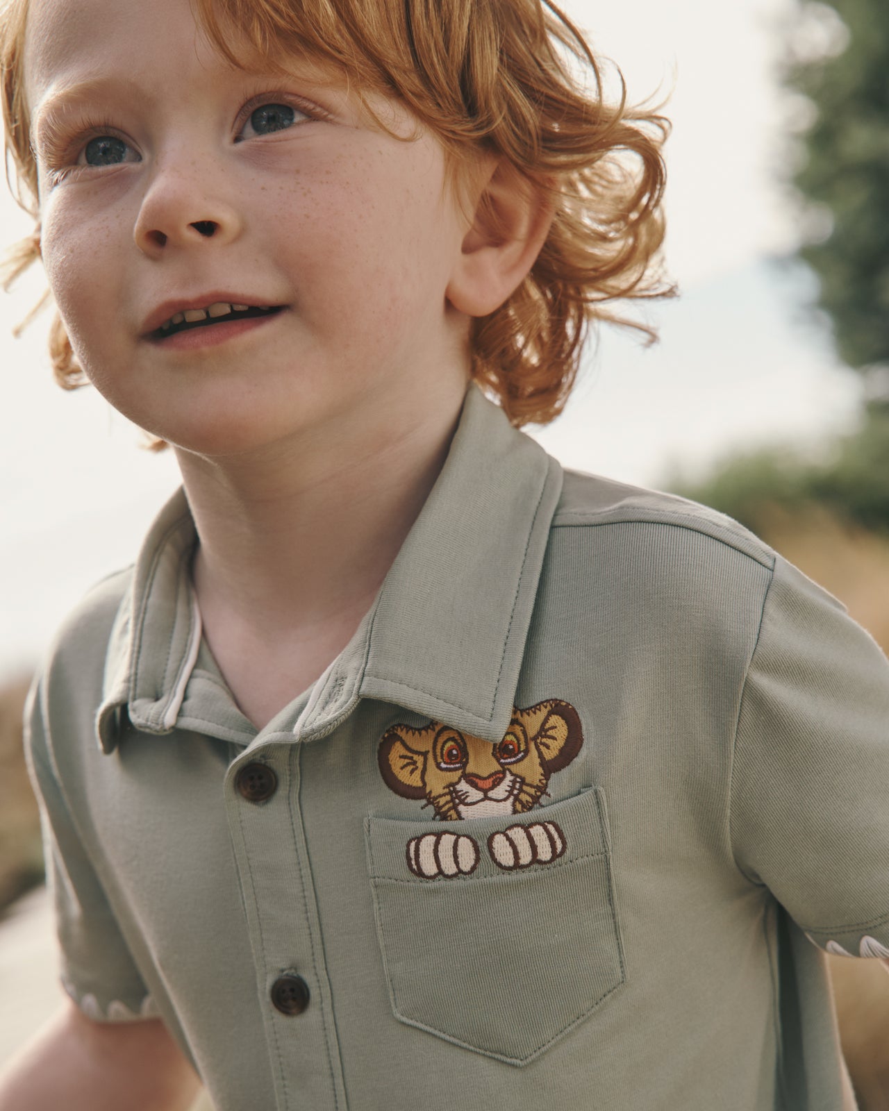 Close up of the pocket detail on the Disney Jungle Trio Button Down Shirt