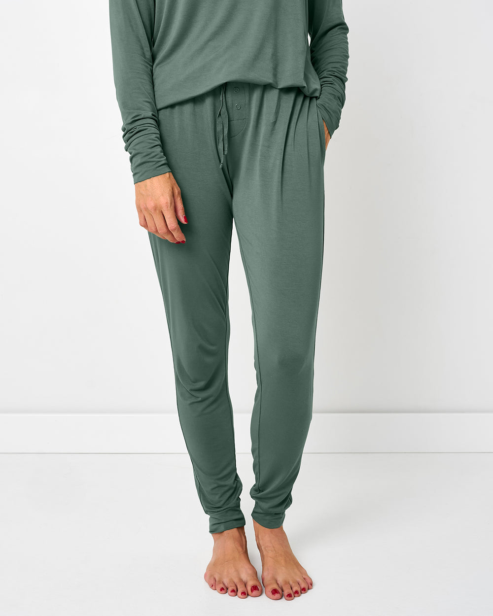 Woman wearing the Grove Green Women's Pajama Pants