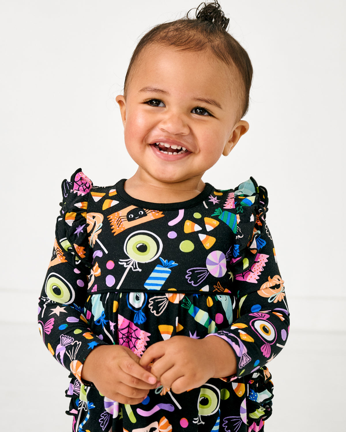Close up of girl wearing the Halloween Haul Bubble Romper