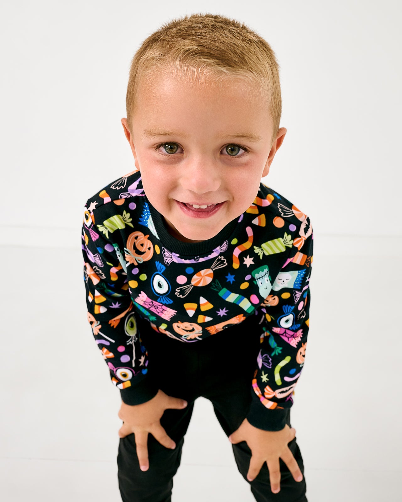 Close up of boy wearing the Halloween Haul Crewneck Sweatshirt
