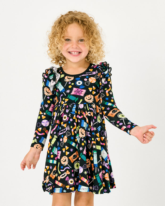 Girl wearing the Halloween Haul Flutter Twirl Dress