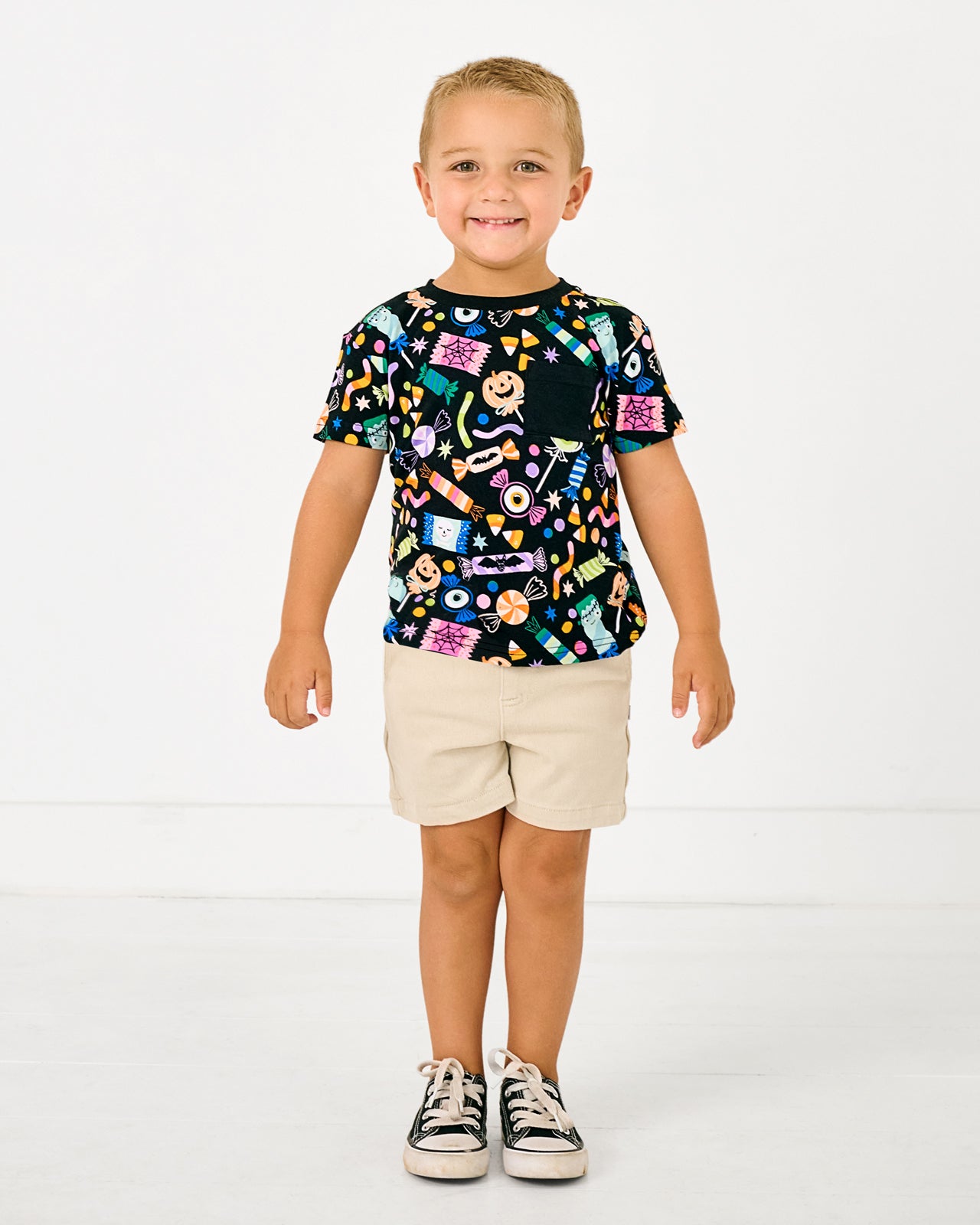 Boy wearing the Halloween Haul Relaxed Pocket Tee with khaki boys shorts