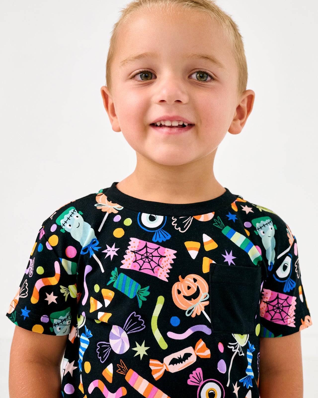 Close up of boy wearing the Halloween Haul Relaxed Pocket Tee