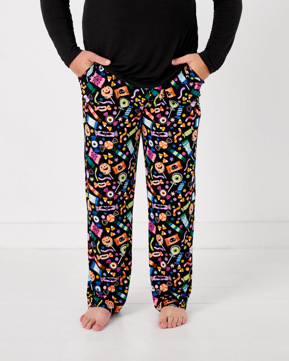 Standing man wearing the Halloween Haul Men's Pajama Pants