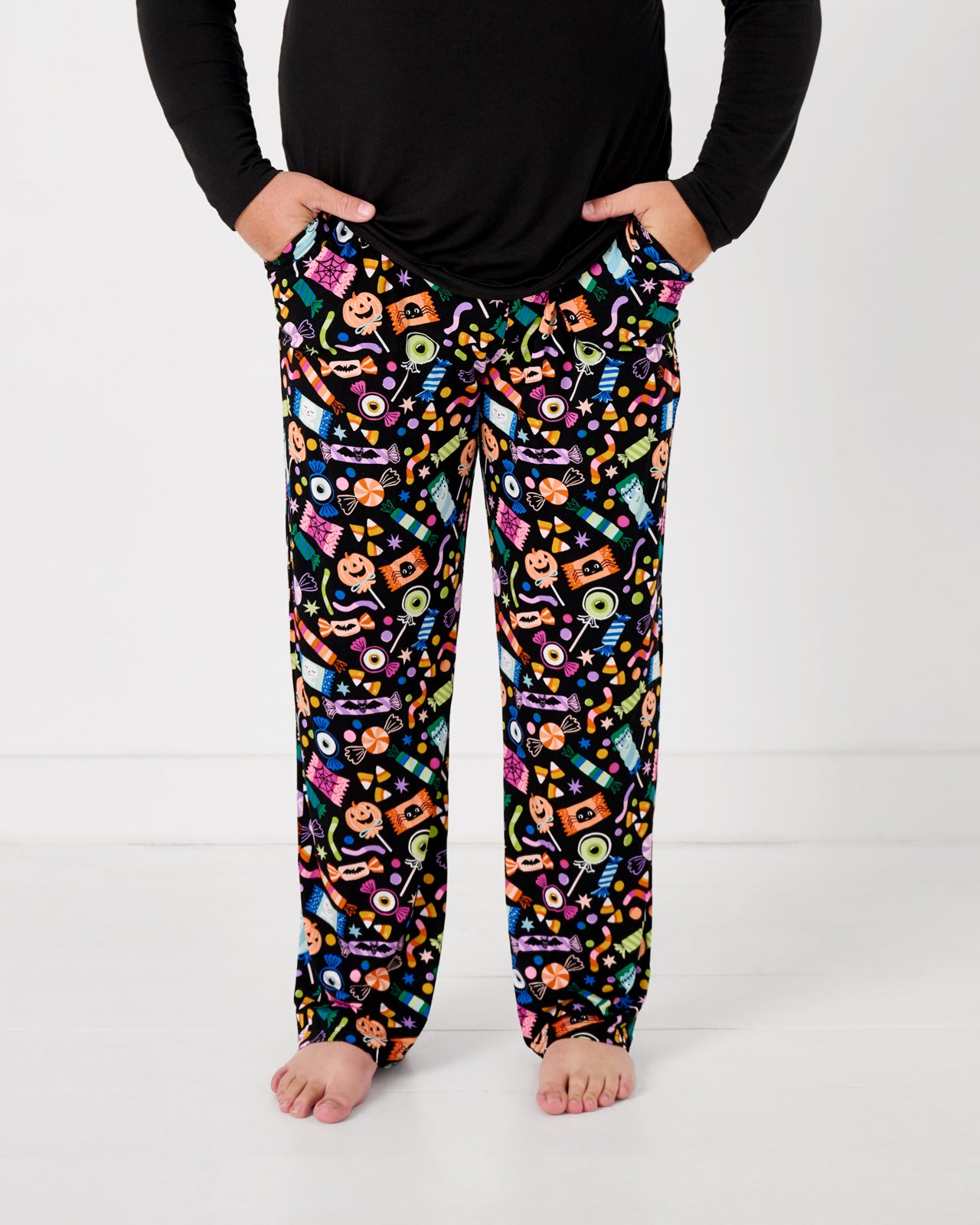 Standing man wearing the Halloween Haul Men's Pajama Pants