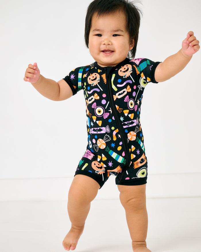 Walking toddler wearing the Halloween Haul Shorty Zippy