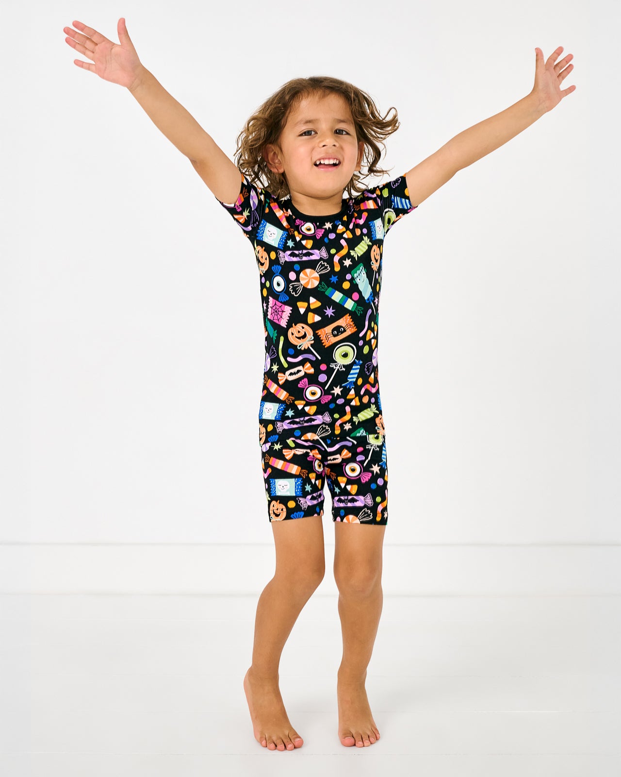 Posing girl wearing the Halloween Haul Two-Piece Short Sleeve & Shorts Pajama Set