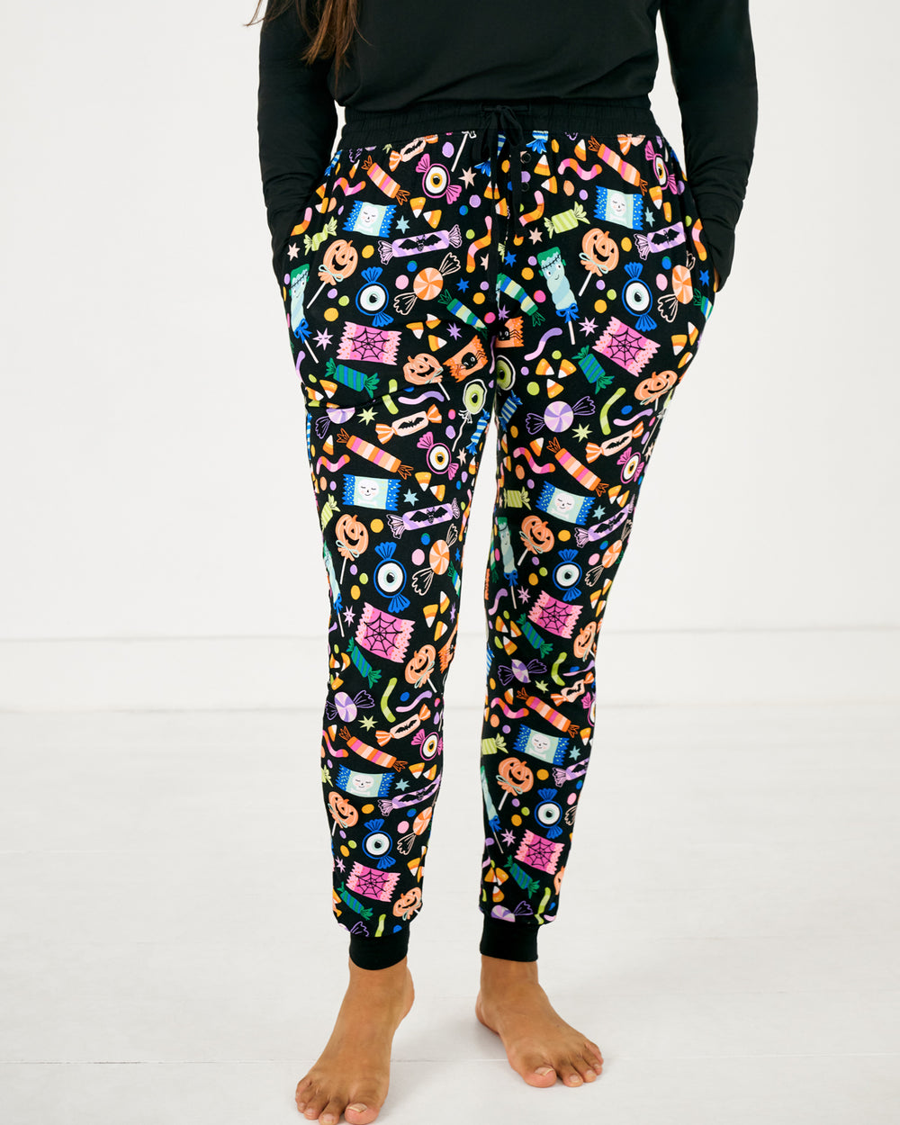 Standing woman wearing the Halloween Haul Women's Pajama Pants