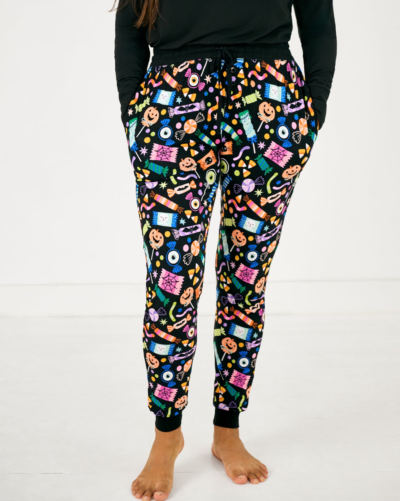 Standing woman wearing the Halloween Haul Women's Pajama Pants