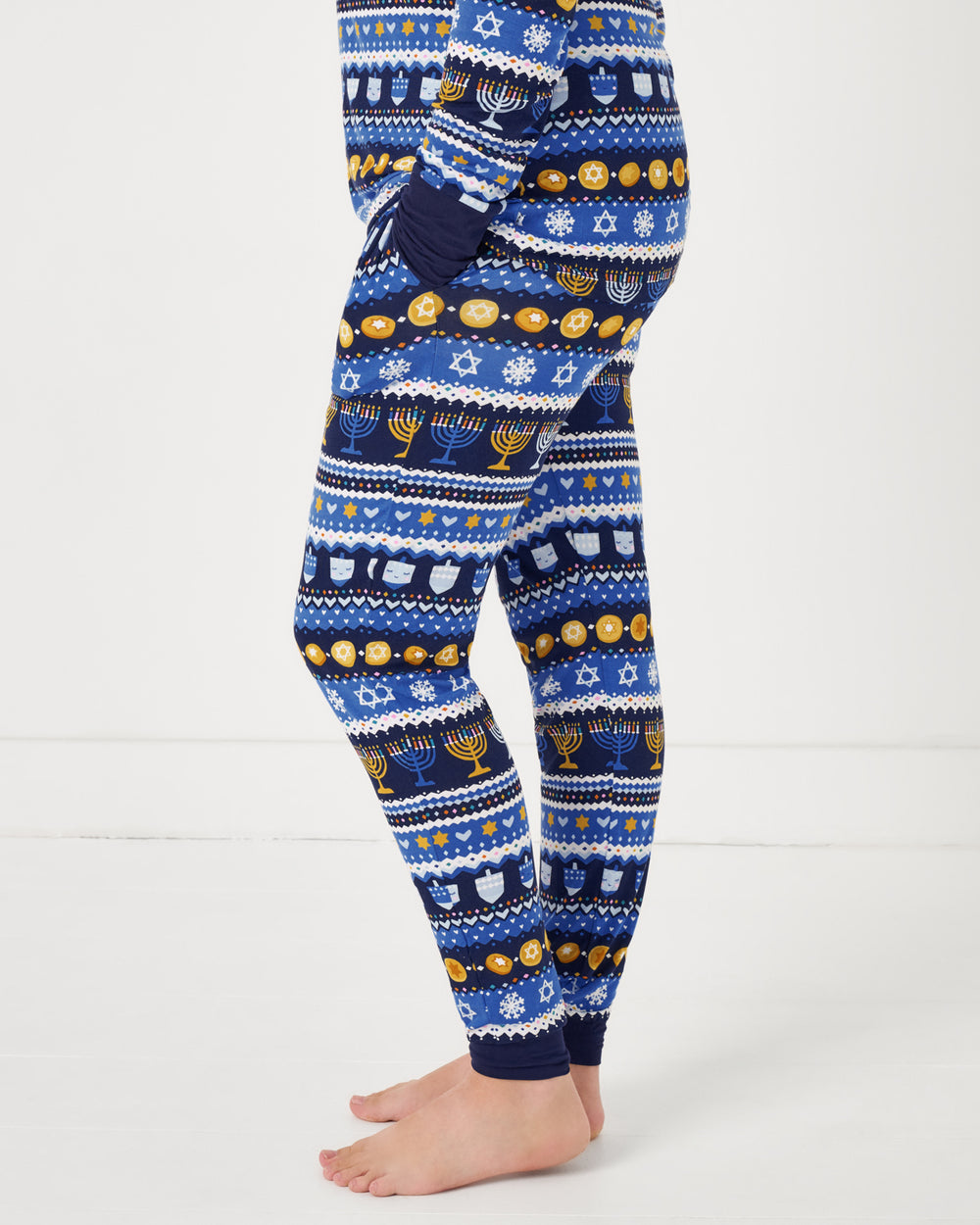 Side view of woman wearing the Hanukkah Fair Isle Women's Pajama Pants
