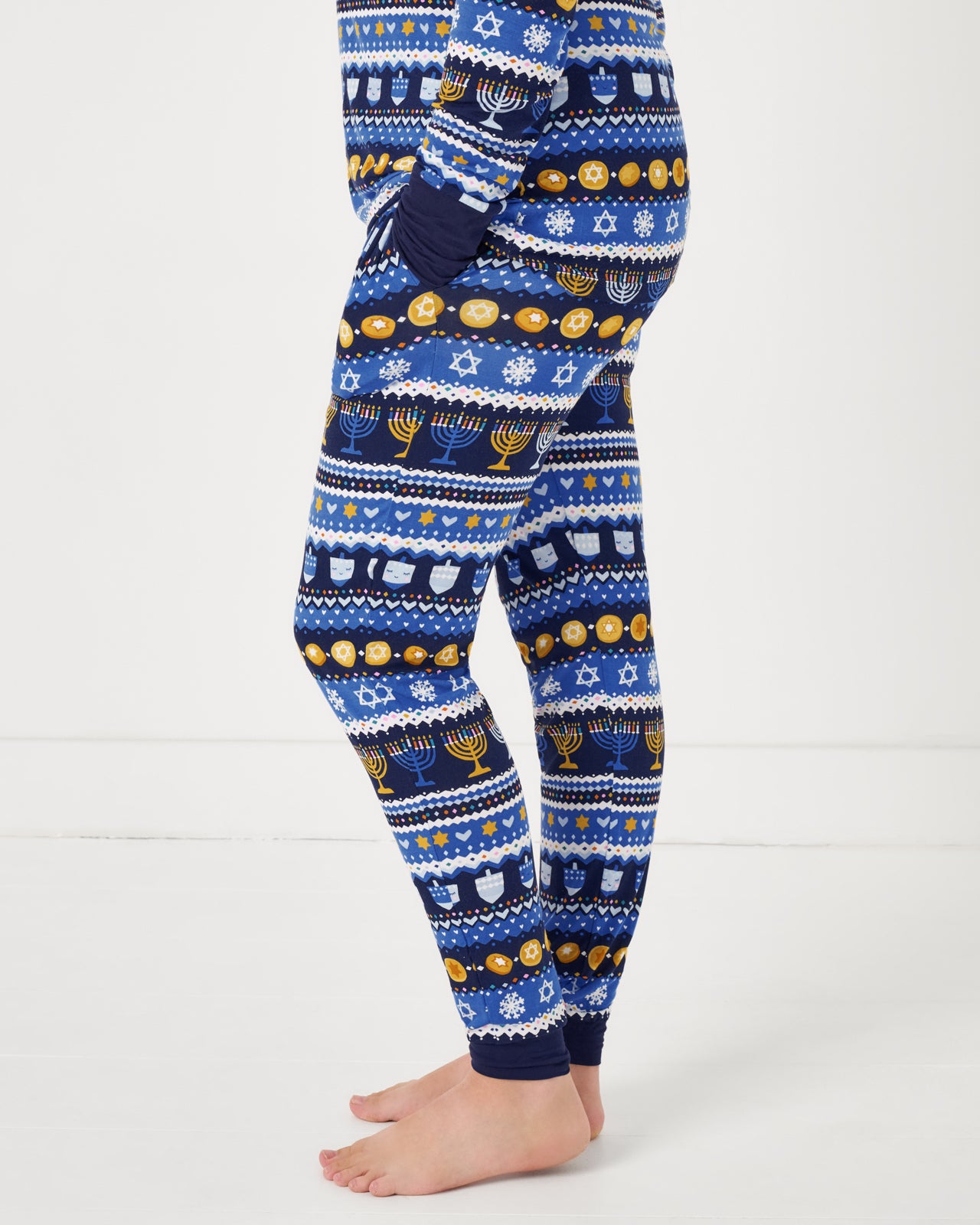 Side view of woman wearing the Hanukkah Fair Isle Women's Pajama Pants