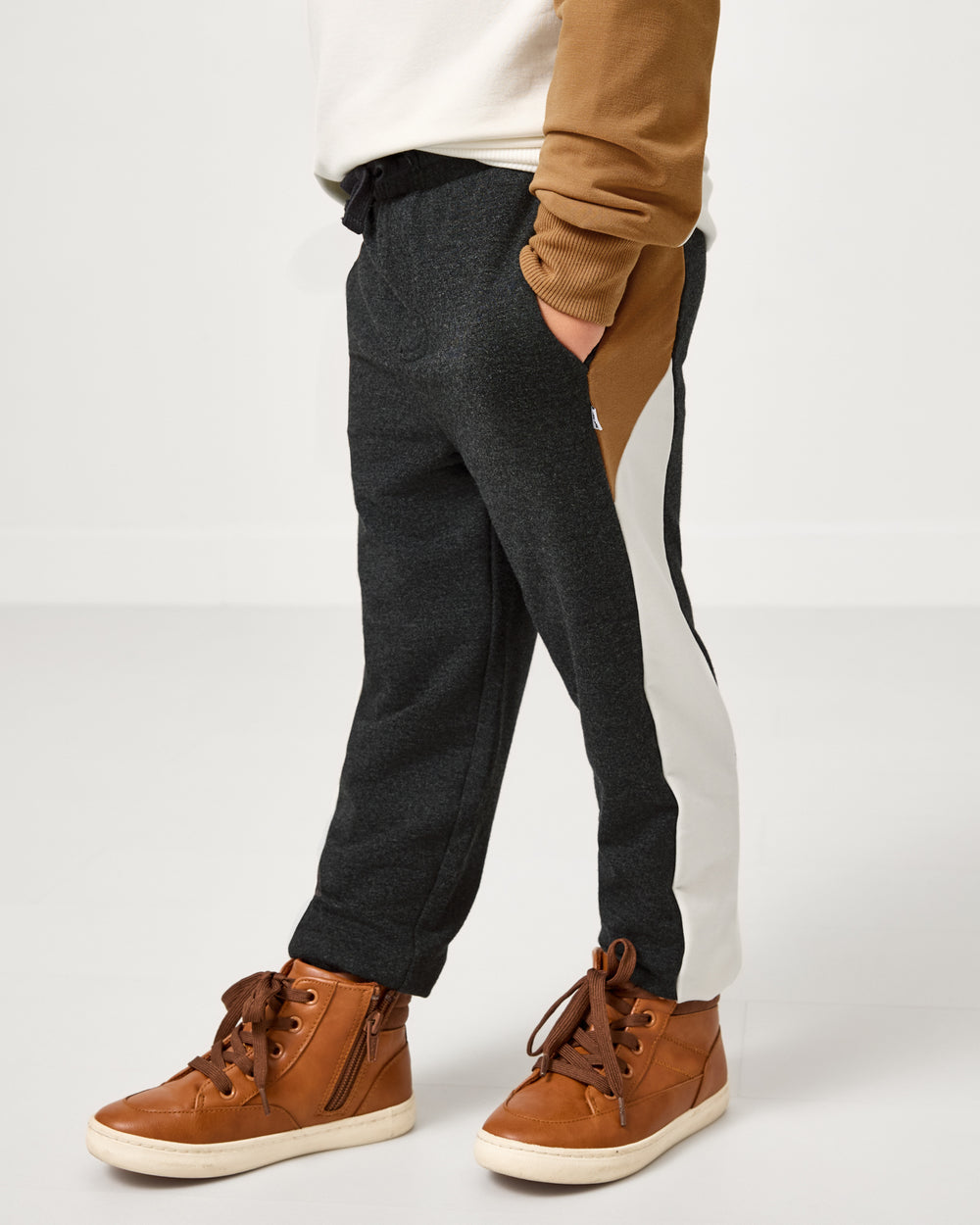 Close up of boy wearing the Heather Black Panel Jogger