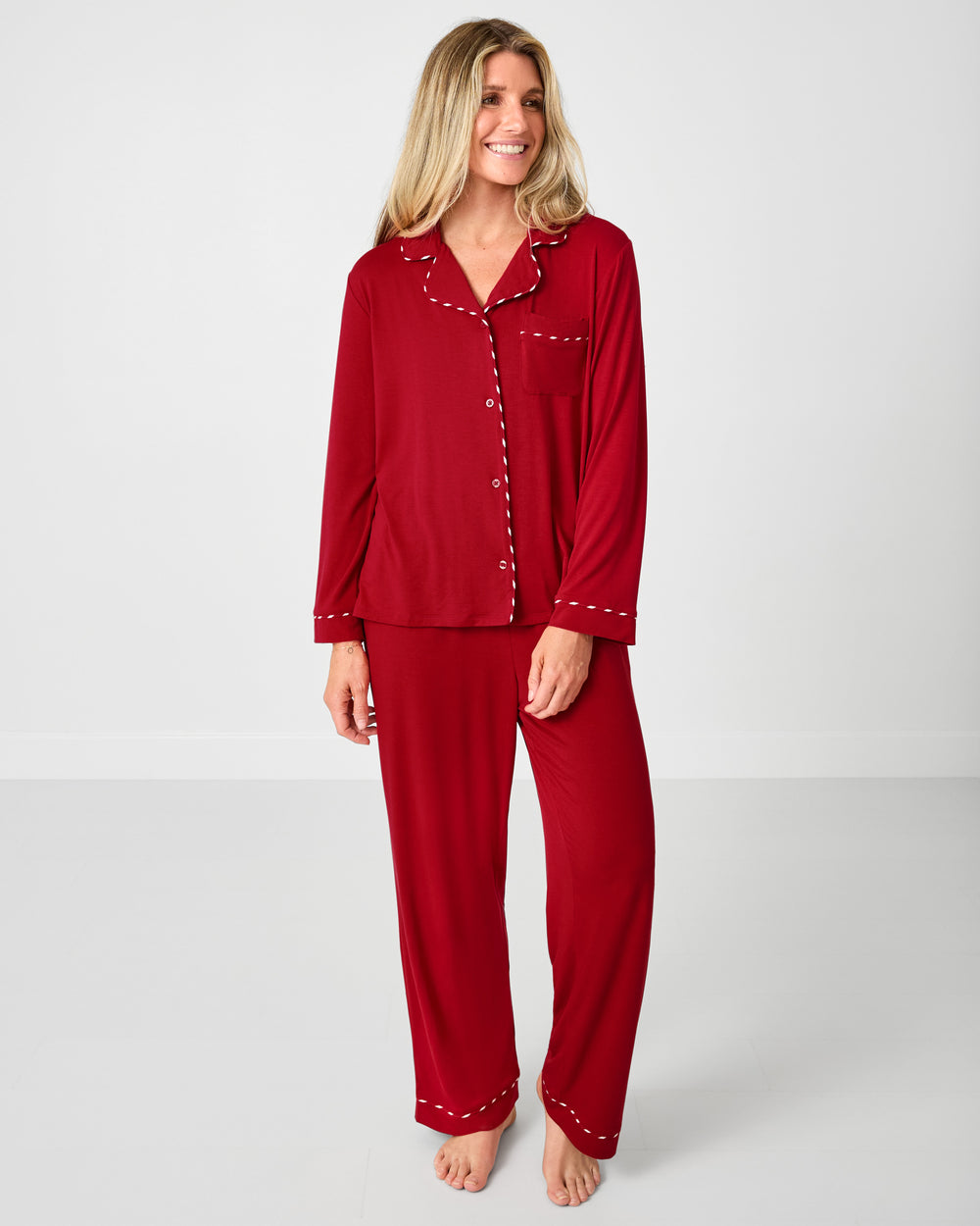 Woman wearing the Holiday Red Women's Long Sleeve Pajama Set