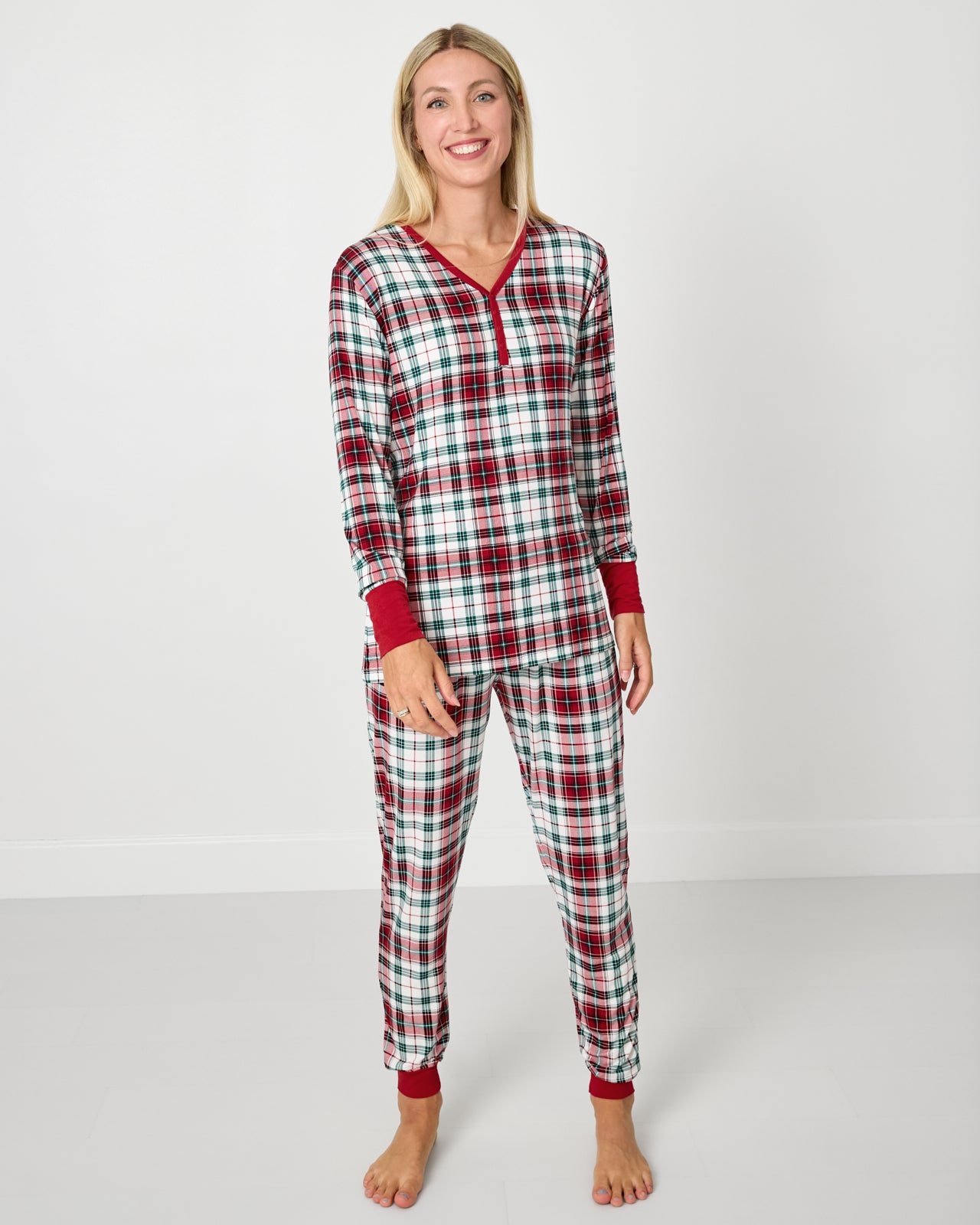 Woman wearing the Holly Plaid Women's Long Sleeve Pajama Top and matching pajama pants
