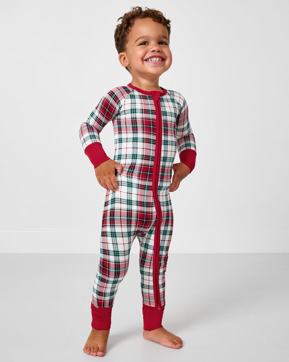 Boy wearing the Holly Plaid Zippy