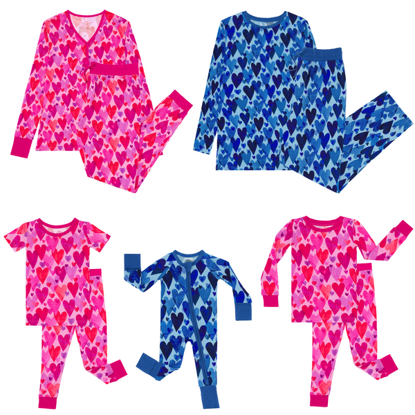 flat lay composite of a blue hearts & crafts zippy and men's pajamas, and pink hearts & crafts two-piece pajama set, two-piece short sleeve pajama set, and women's pajamas