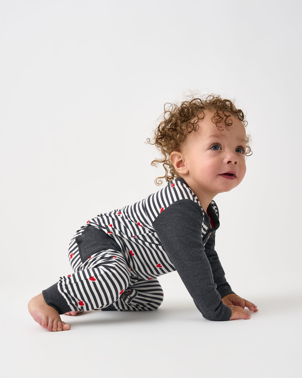 Alternate of crawling baby wearing the Heartstrings Stripe Henley Romper