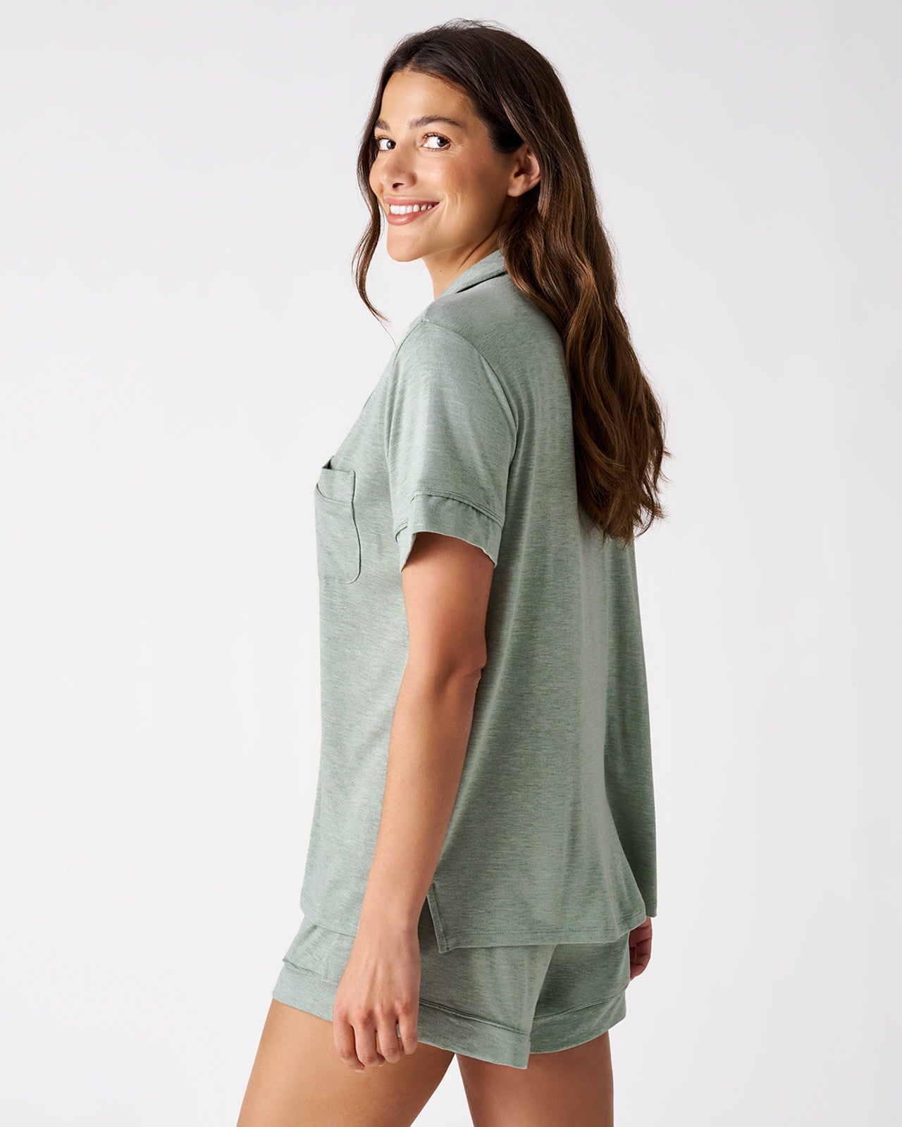 Back view of woman wearing the Heather Sage Women's Short Sleeve & Shorts Pajama Set