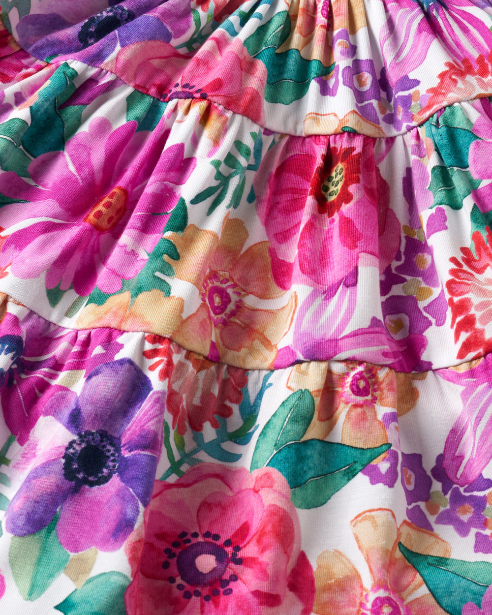 Close up of the tiered detail on the Hibiscus Blooms Tiered Flutter Dress with Bloomer