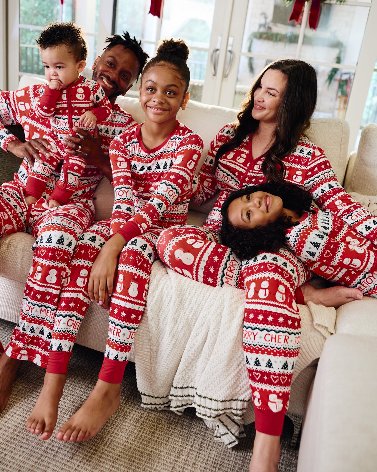 Family wearing coordinating Festive Fair Isle bamboo pajamas