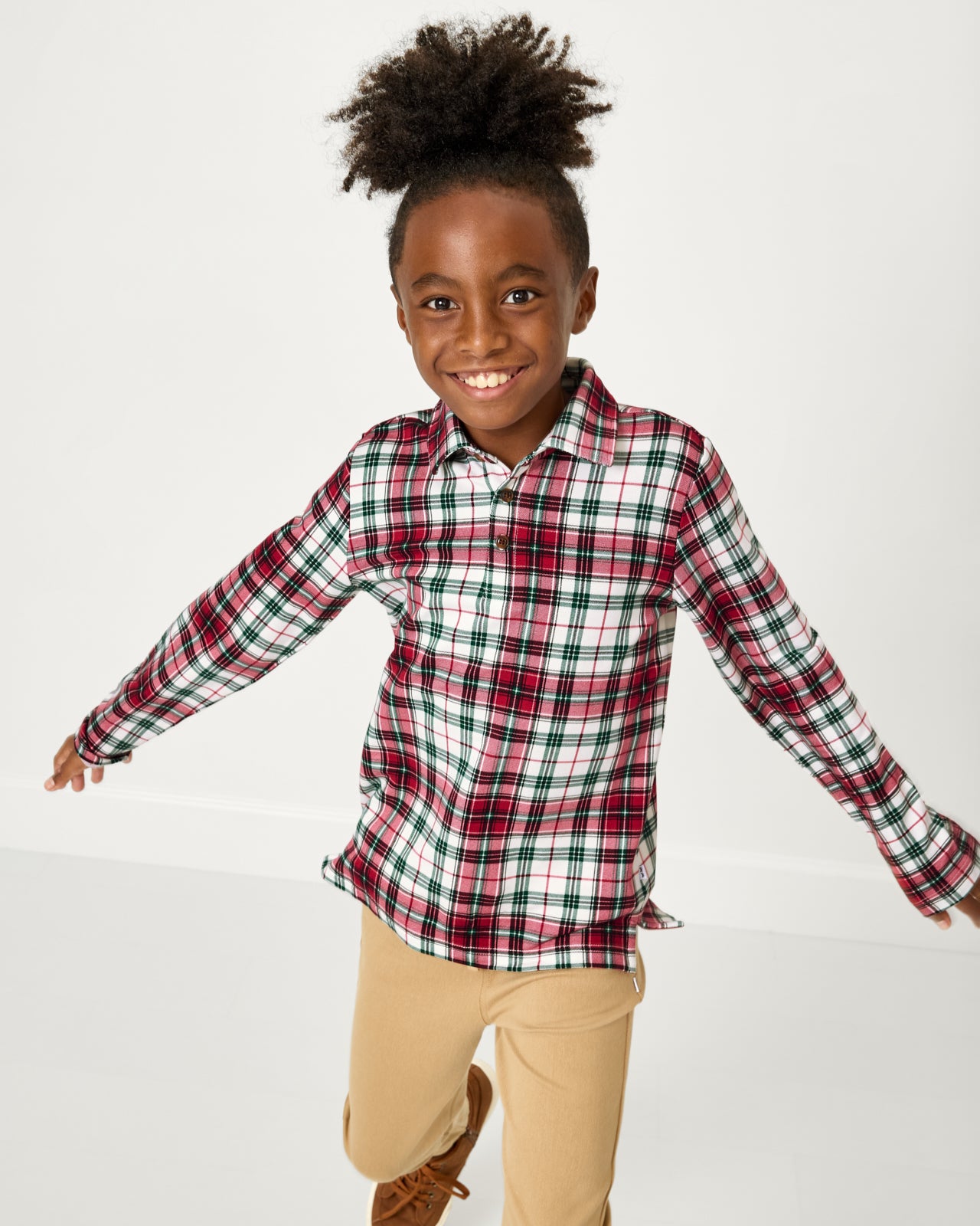 Boy wearing the Holly Plaid Polo Shirt