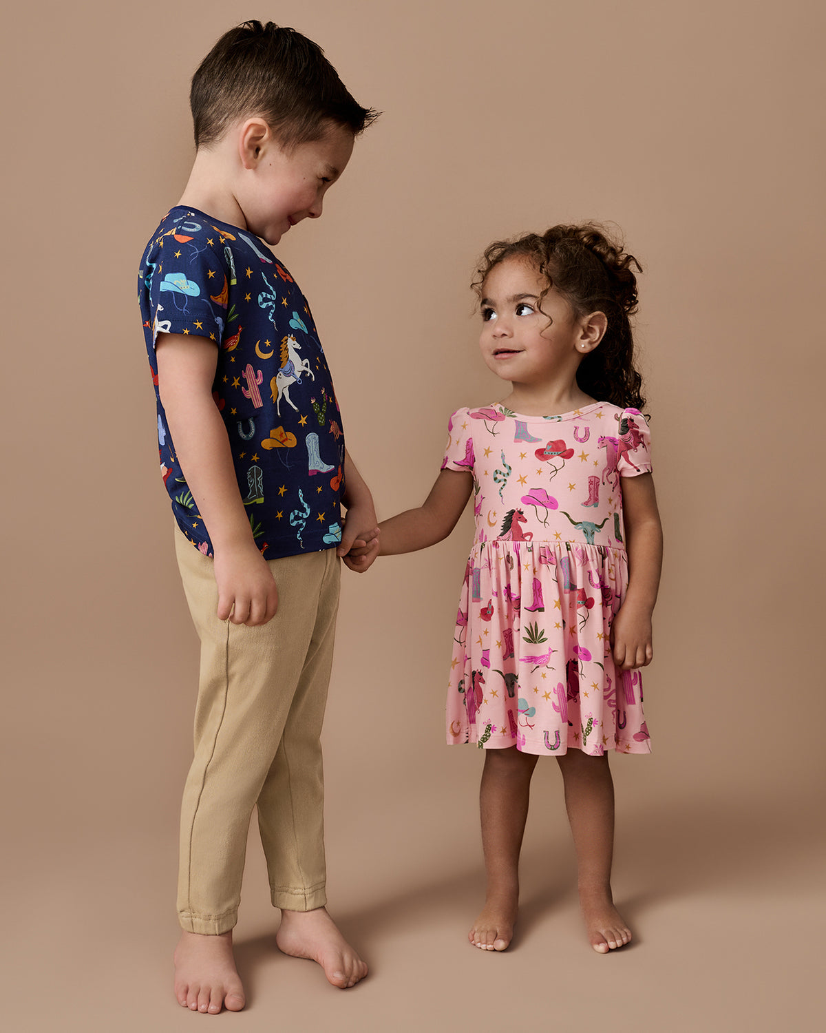 Two kids wearing Rancher Roundup Daywear styles