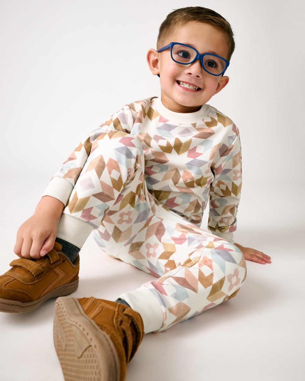 Alternate of sitting boy wearing the Kaleidoscope Dreams Joggers