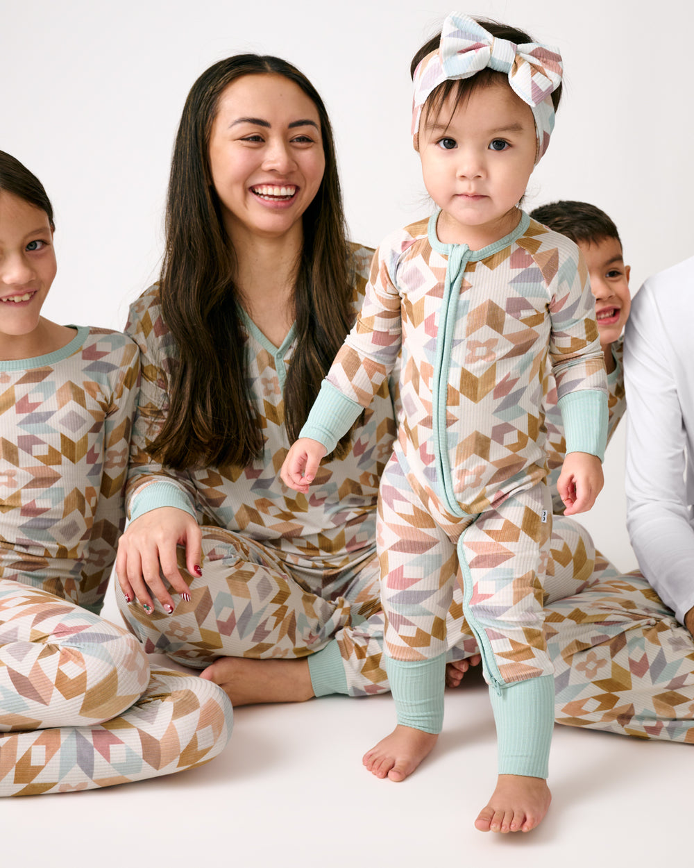 Family wearing matching Kaleidoscope Dreams Ribbed Pajamas