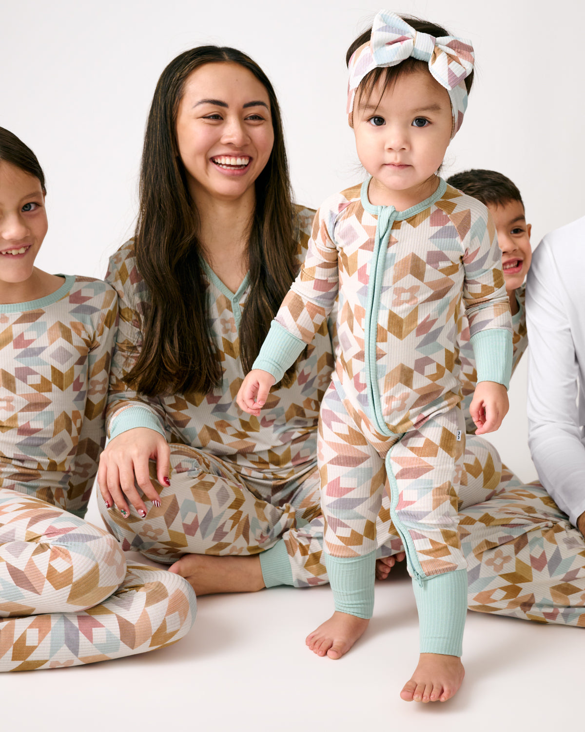 Family wearing matching Kaleidoscope Dreams Ribbed Pajamas